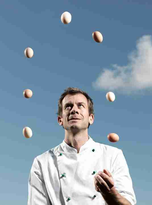 a chef juggling eggs representing the many responsibilities people have